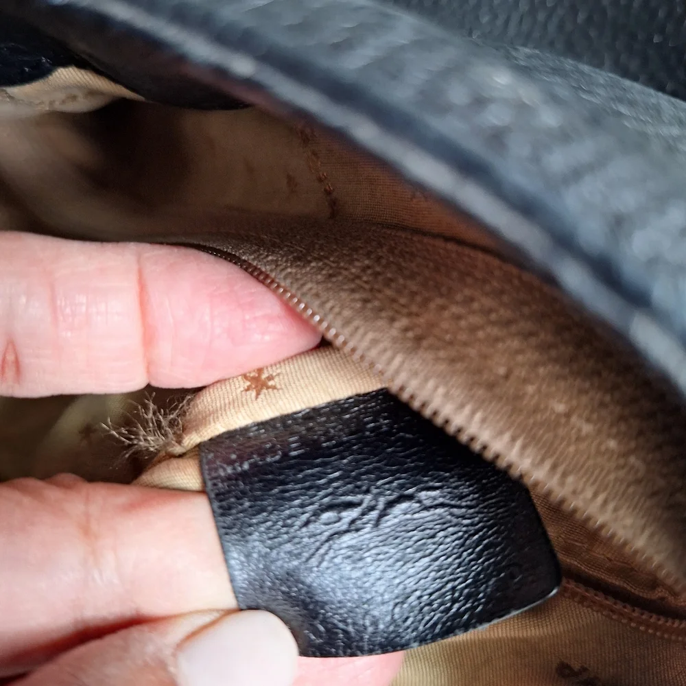 Longchamp Pebbled Black leather Bag.